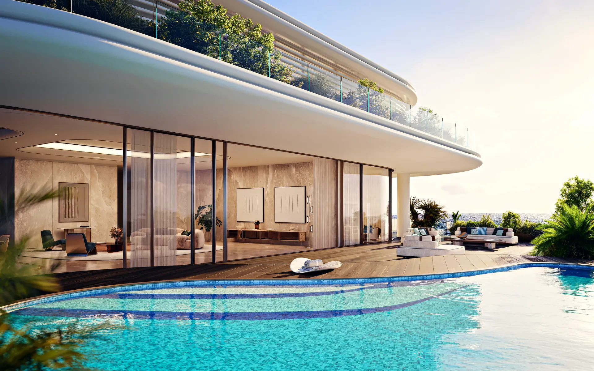 A terrace and its pool at Jacob & Co. Beachfront Living