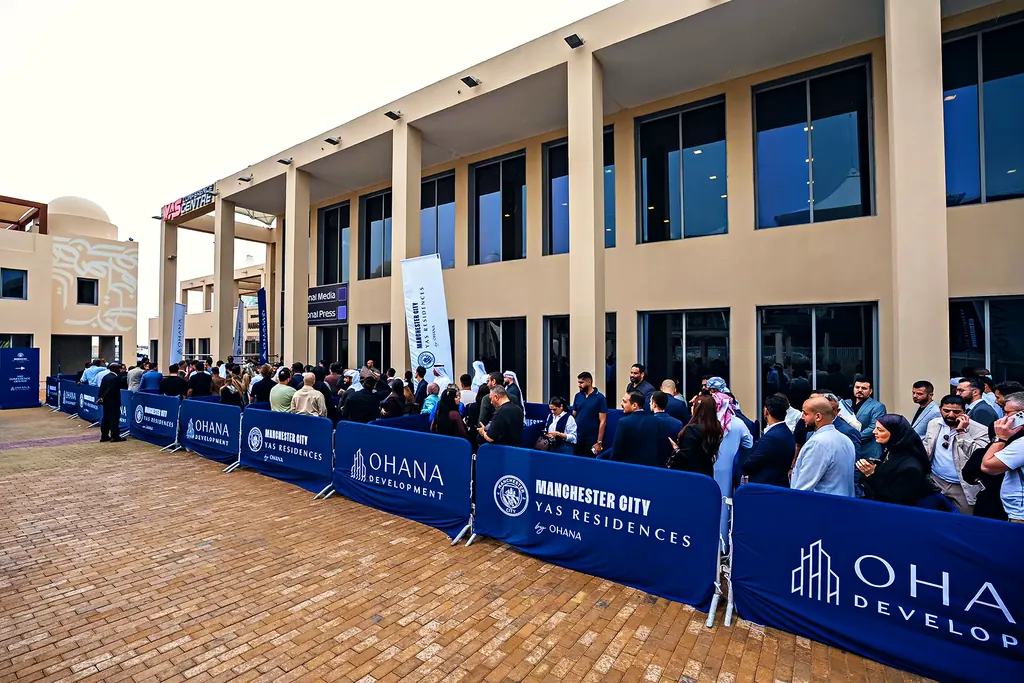 Crowds outside the sales centre during the record launch